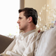 Illustration for article titled Man Desperately Trying To Wring Every Last Ounce Of Relaxation From Final Day Of Vacation